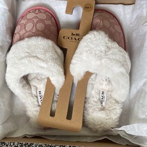 Brand new coach slippers never worn